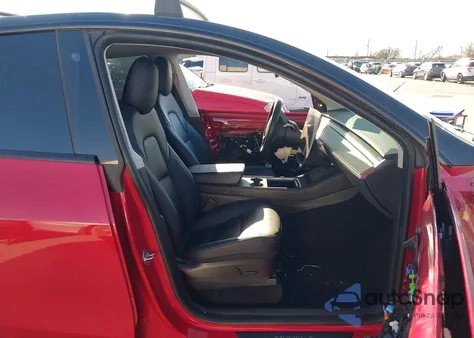 2023 Tesla Model Y Performance Dual Motor All-Wheel Drive z USA, uszkodzony, nr VIN 7SAYGDEF6PF603066